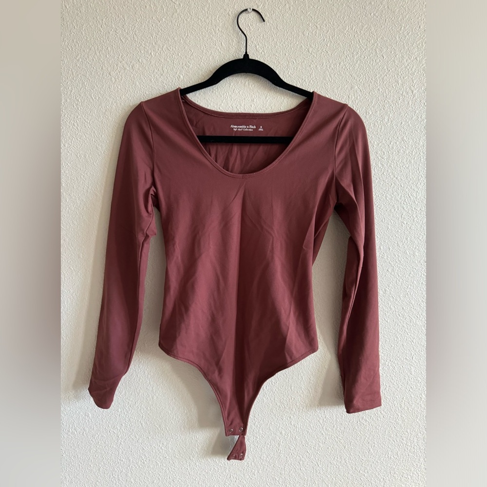 Abercrombie & Fitch - long sleeve rust colored bodysuit in size S